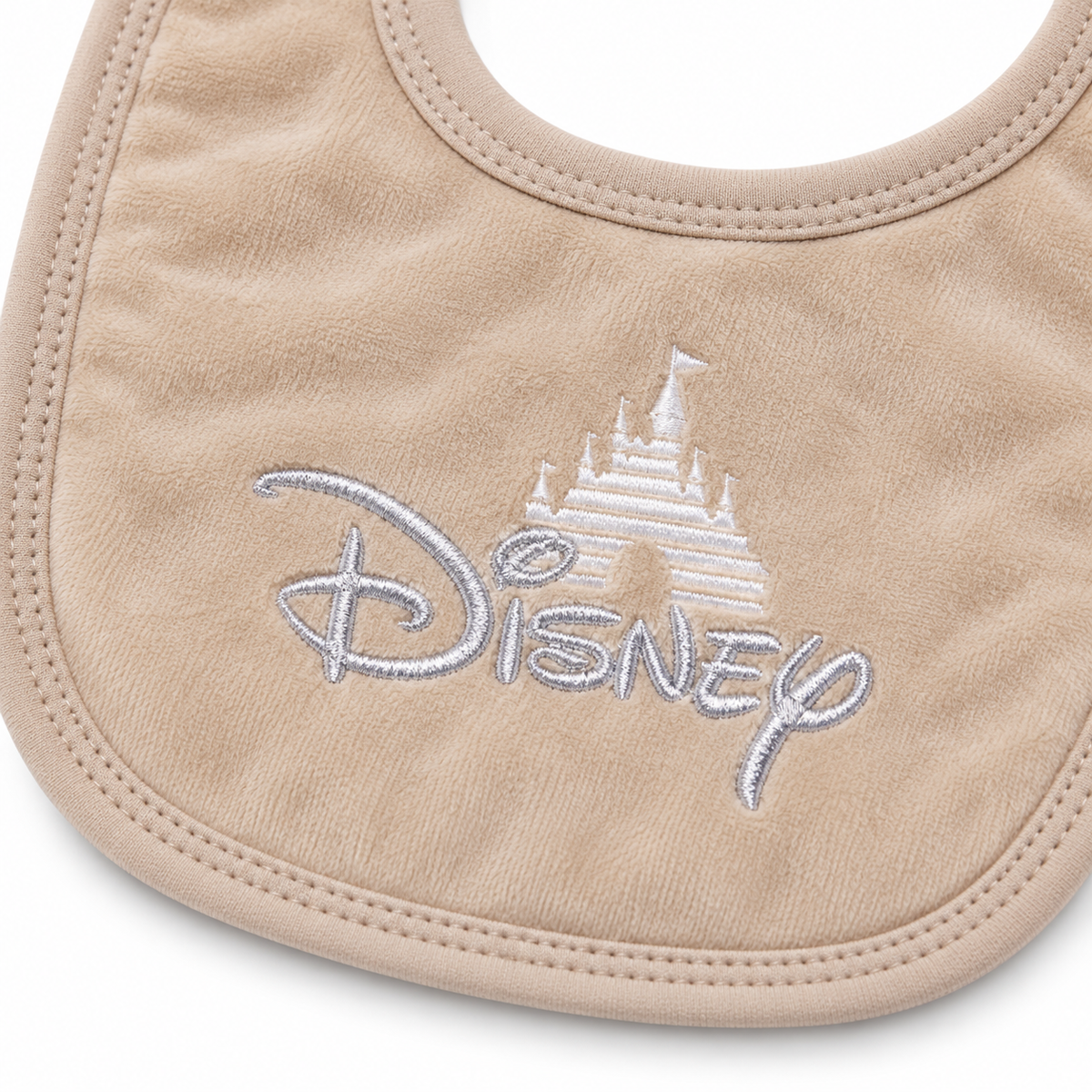 7 Piece Winter Starter Set Disney Beige & White — Disney bib embroidery close-up