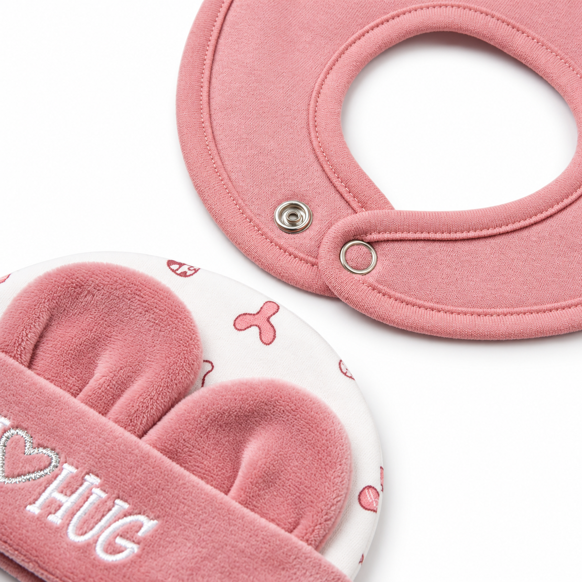 7 Piece Winter Starter Set Disney Pink & White — Bib fasteners and mittens close-up