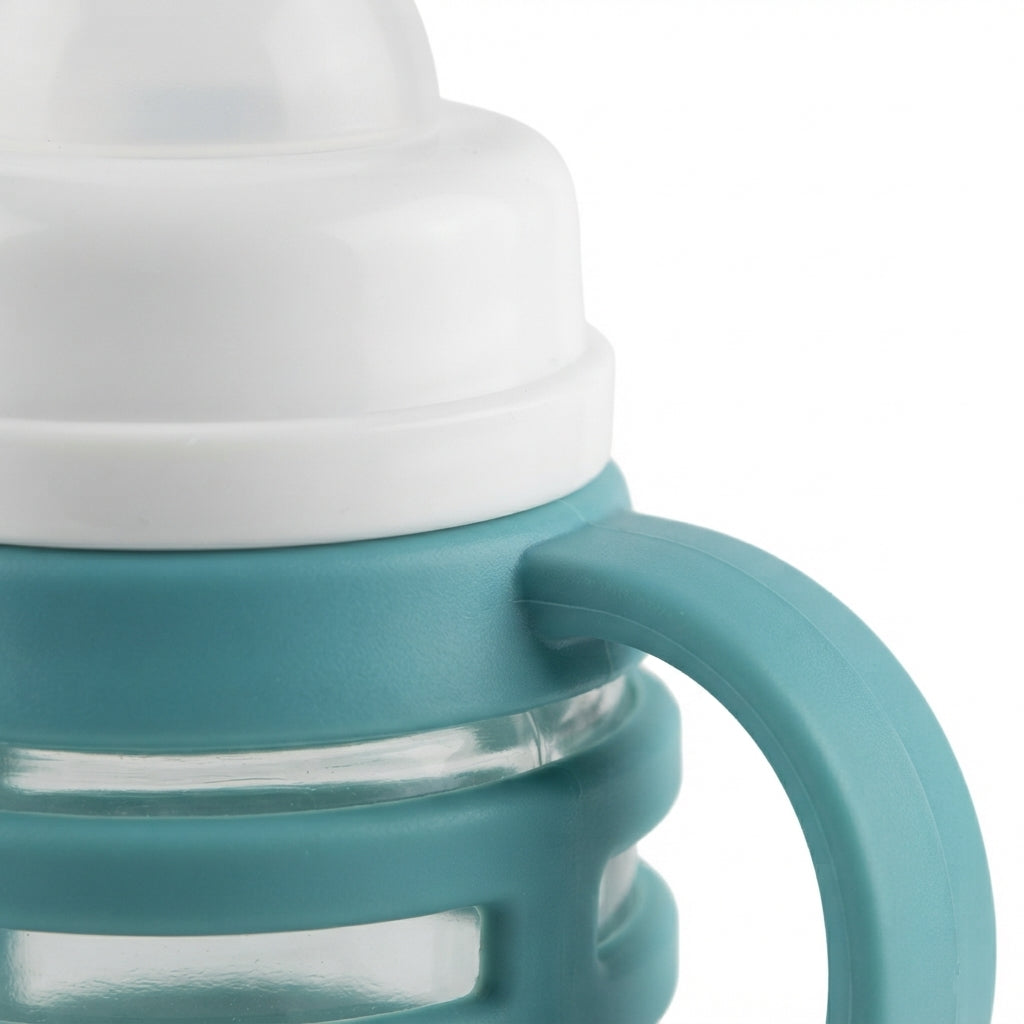 BABY GLASS FEEDER STAR CAP GREEN YES