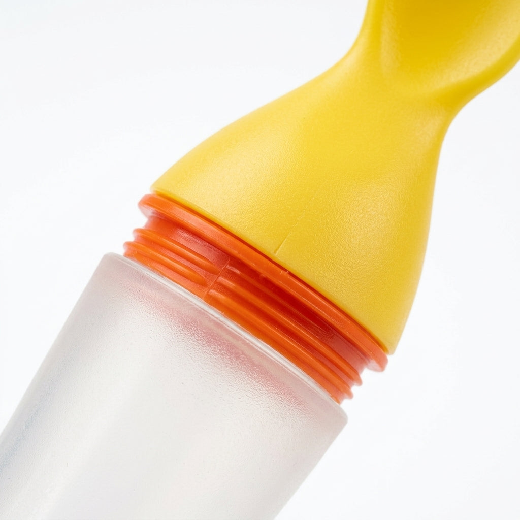 BABY SPOON FEEDER SILICONE YELLOW