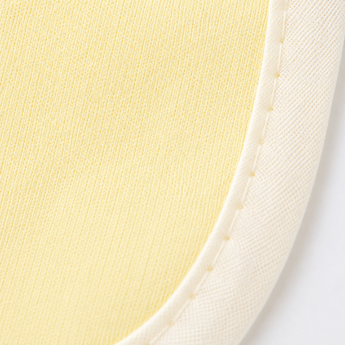 BABY PLASTIC BIB BUTTON GIRAFFE YELLOW