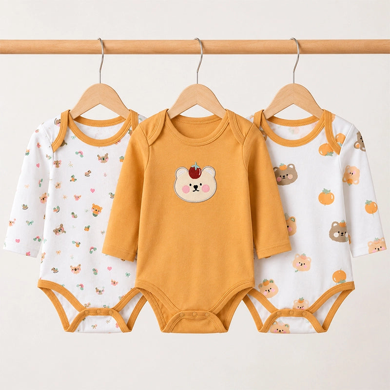 Mustard full-sleeve cotton baby bodysuits with bear print, pack of 3