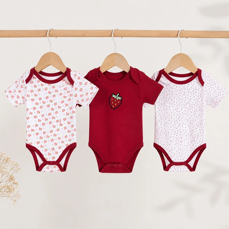 Red half-sleeve cotton baby bodysuits with strawberry print, pack of 3
