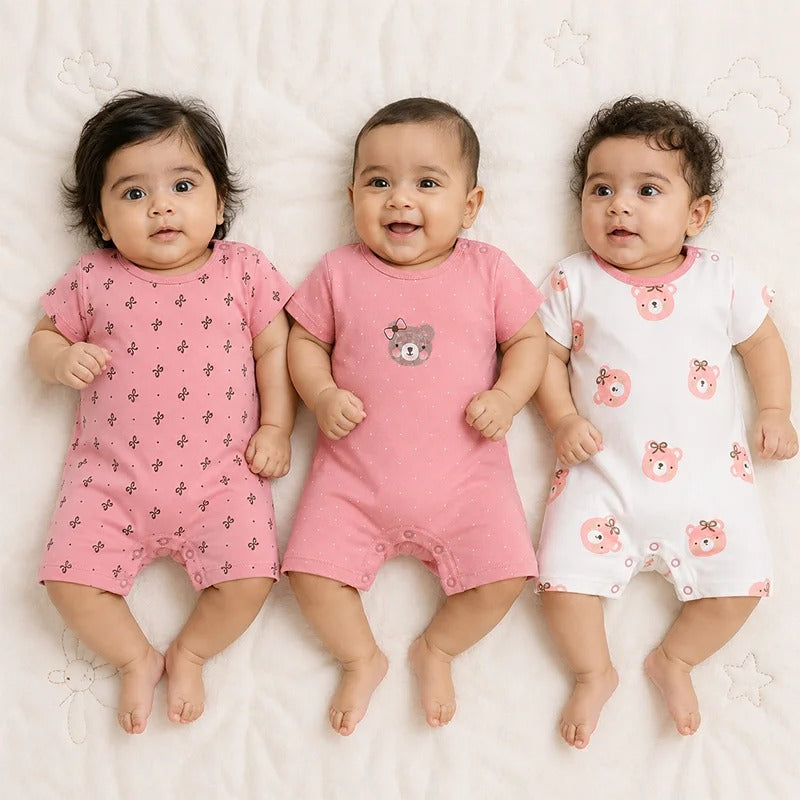 Additional view of pink and white short-sleeve cotton baby rompers with teddy print from the pack of 3