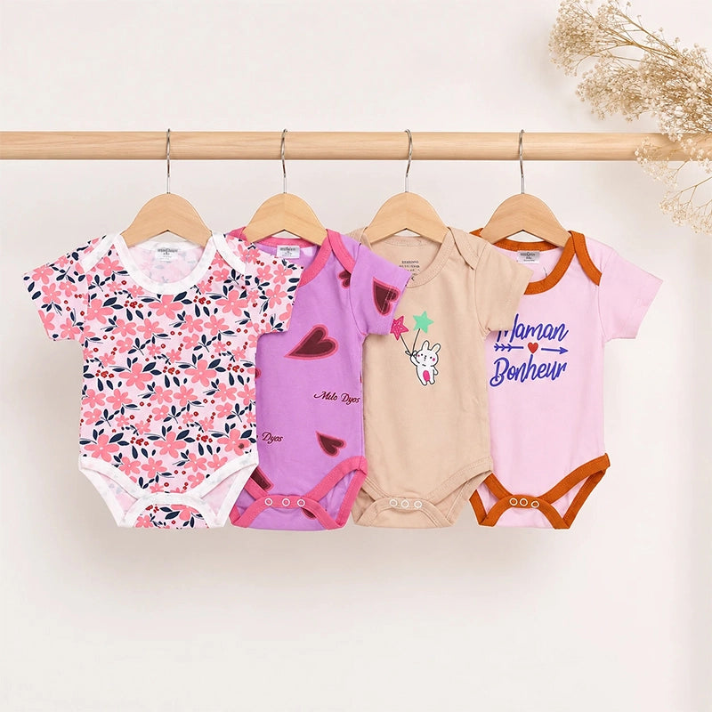 Pink and multicolour cotton baby bodysuits with star and mixed prints, pack of 4